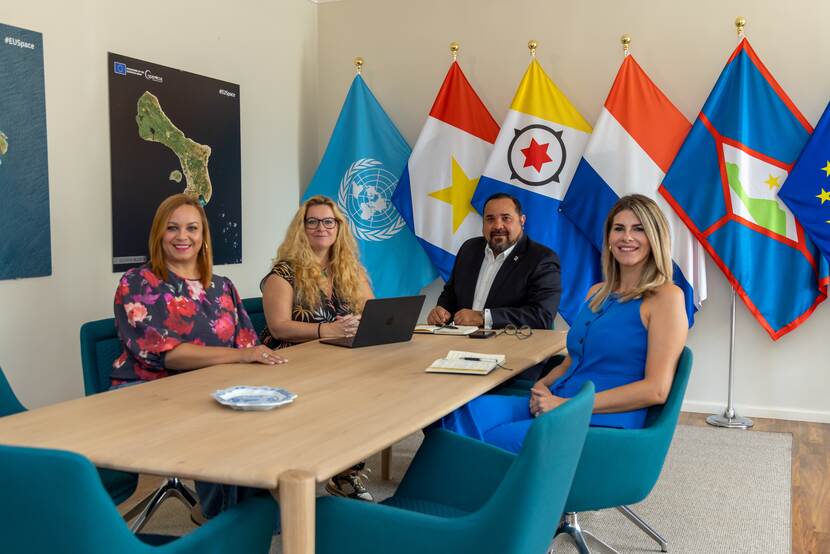 Team picture showing the Special Envoy, Liaison, Secretary, and Senior Project Mananger.